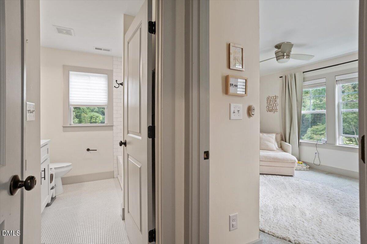 1303 Nottingham Road Raleigh, NC 27607 - Photo 22 of 33 a bathroom with a tub sink and mirror