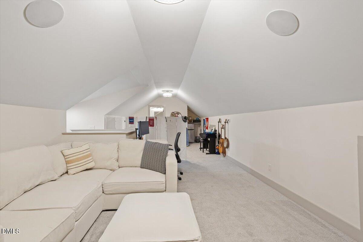 1303 Nottingham Road Raleigh, NC 27607 - Photo 25 of 33 a living room with furniture and a table