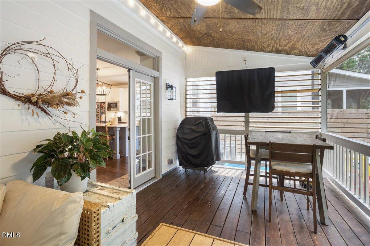 1303 Nottingham Road Raleigh, NC 27607 - Photo 32 of 33 a workspace with furniture window and wooden floor