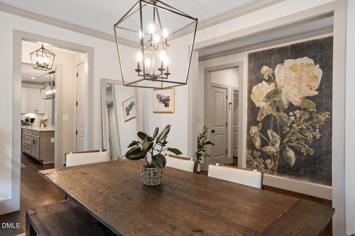 1303 Nottingham Road Raleigh, NC 27607 - Photo 5 of 33 a view of a dining room with a bathroom