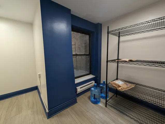 a view of livingroom with furniture and wooden floor