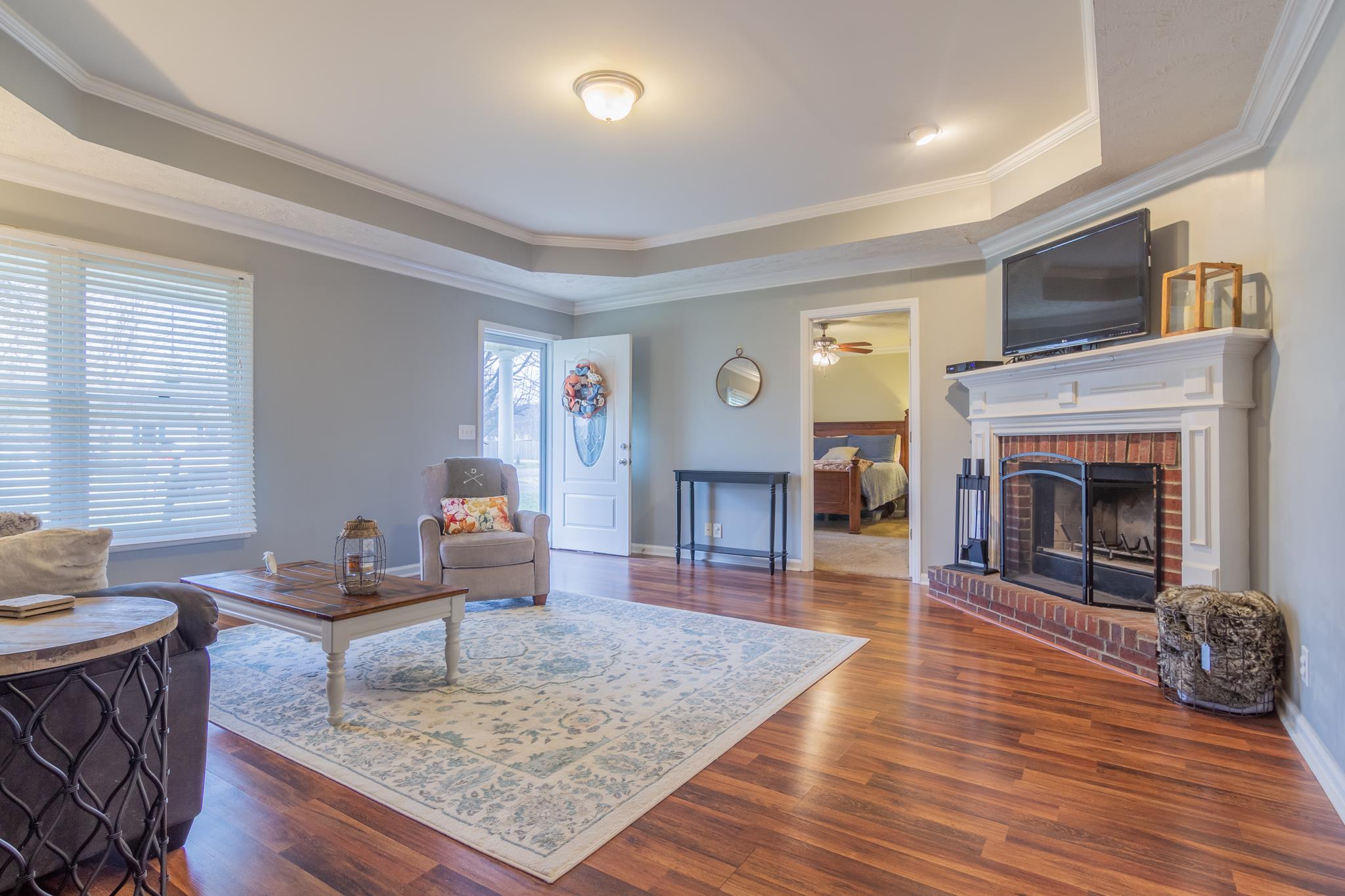 3369 Howard Road Murfreesboro, TN 37127 - Photo 2 of 21 Great Room-Fireplace/Nice Laminate Hardwood