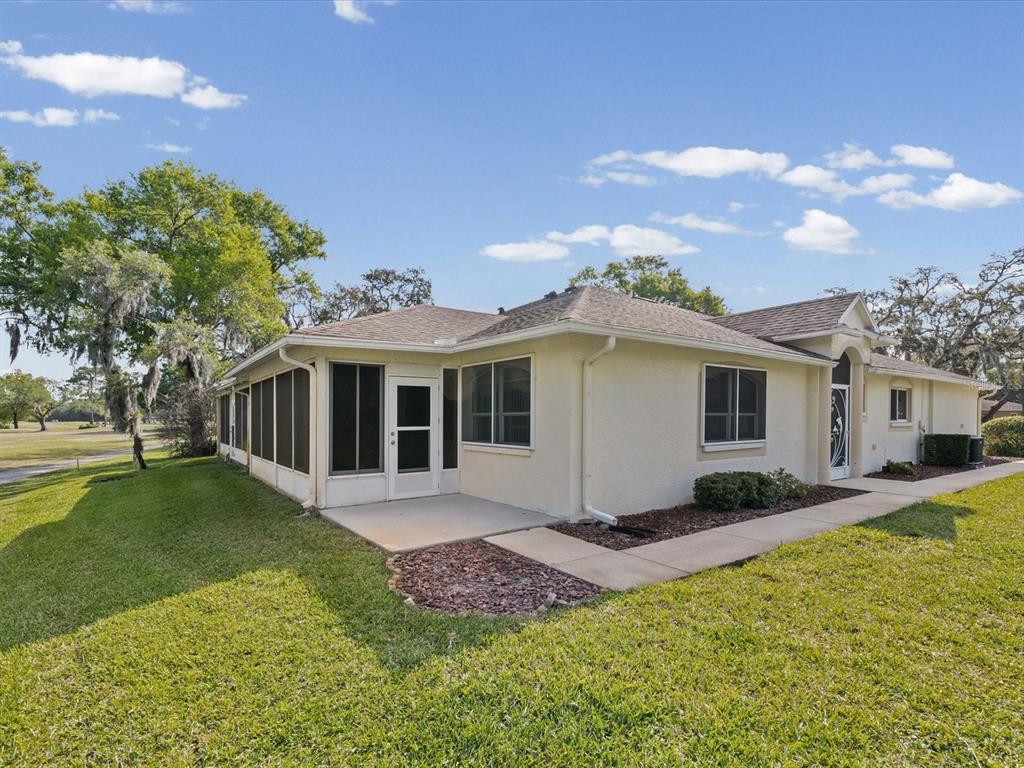 11621 Holly Ann Drive New Port Richey, FL 34654 - Photo 5 of 59 a view of a yard in front of house