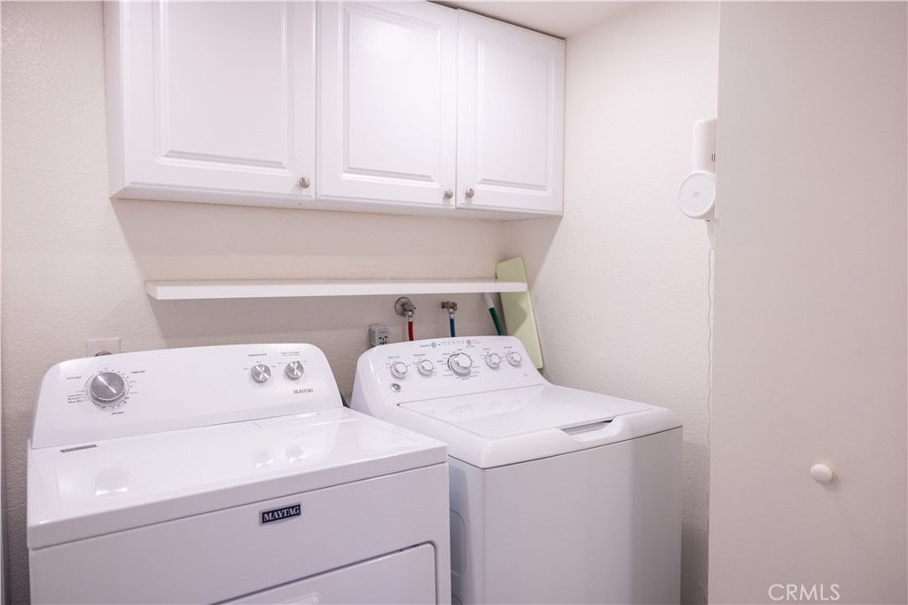 21991-143 Rimhurst Drive Lake Forest, CA 92630 - Photo 6 of 14 a utility room with dryer and washer