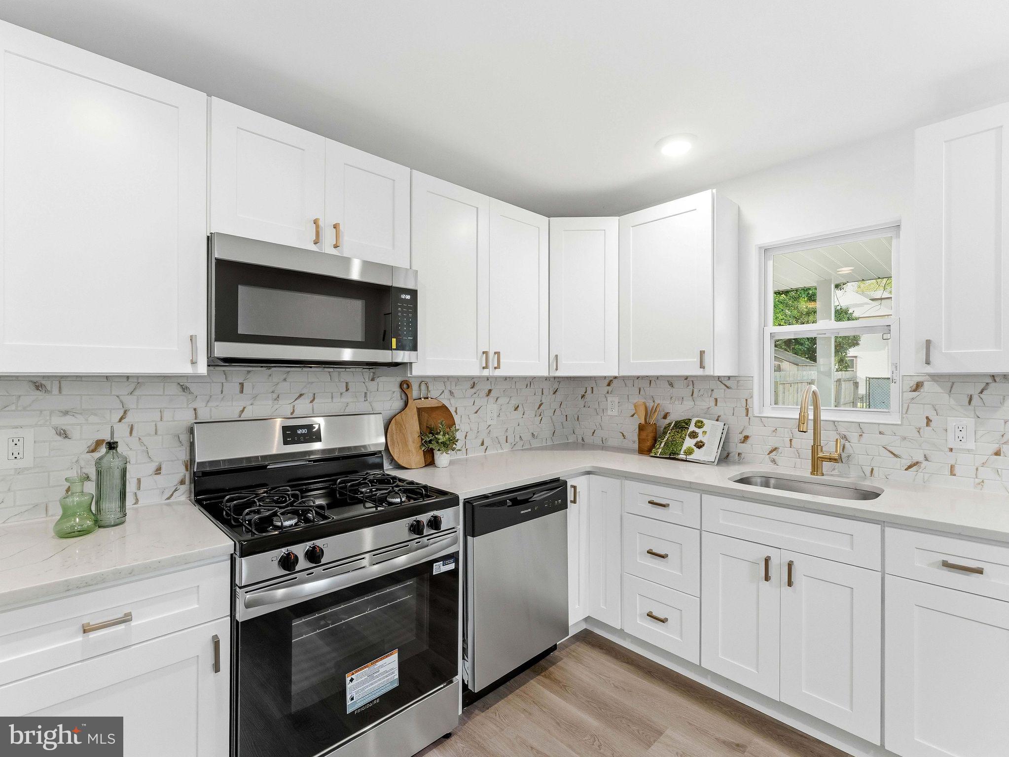 232 Washington Street Delanco, NJ 08075 - Photo 17 of 33 Modern kitchen with sleek finishes.
