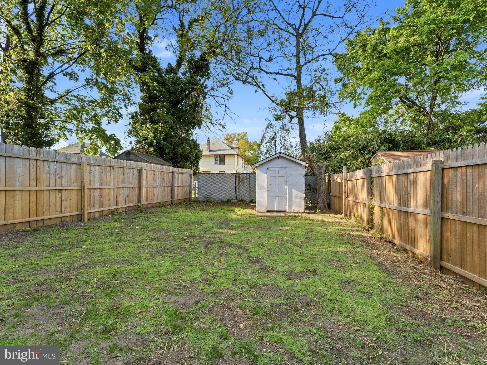 232 Washington Street Delanco, NJ 08075 - Photo 32 of 33 Spacious backyard with serene greenery.