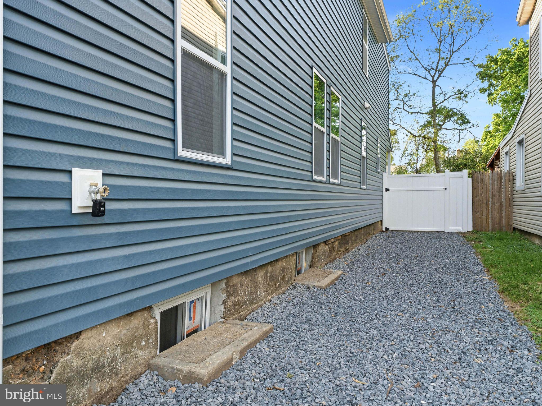 232 Washington Street Delanco, NJ 08075 - Photo 4 of 33 Charming side yard with gravel path.