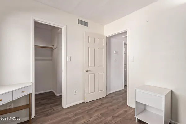 a view of entryway with wooden floor