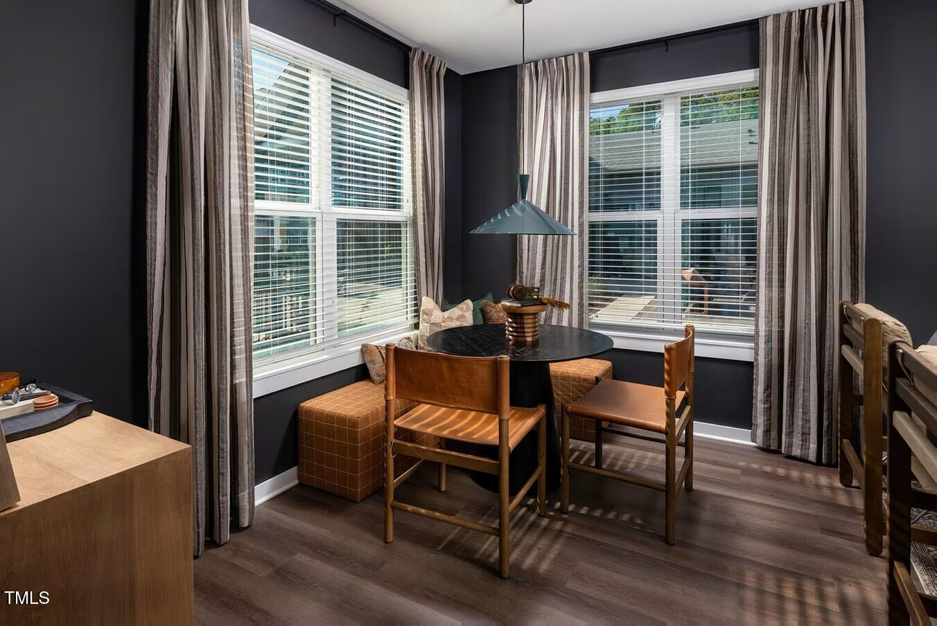 821 Hanbury Way, Unit A1 1 Raleigh, NC 27607 - Photo 13 of 43 a outdoor dining room with furniture and windows