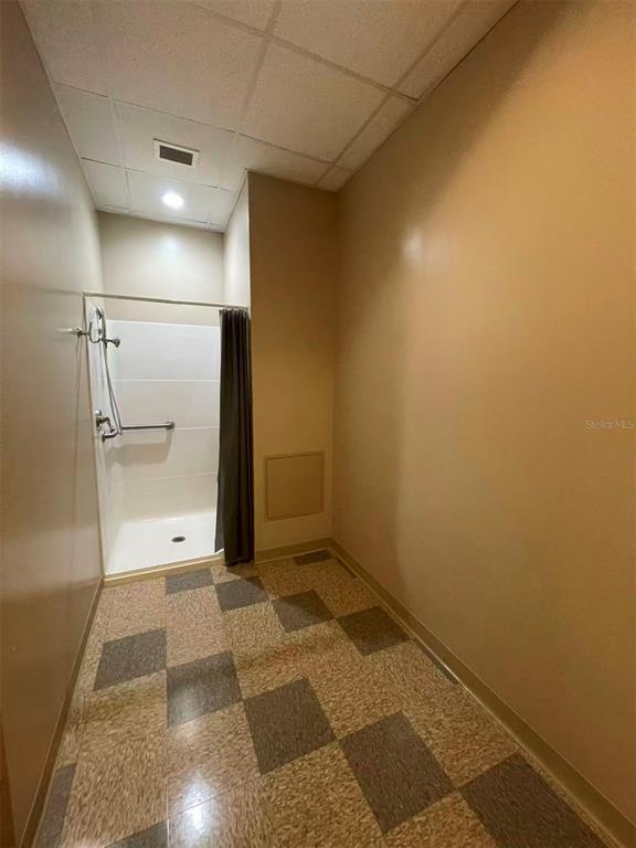 7075 Kingspointe Parkway, Unit 9 Orlando, FL 32819 - Photo 26 of 49 a view of bathroom