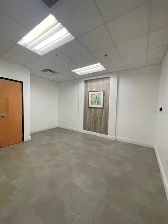 7075 Kingspointe Parkway, Unit 9 Orlando, FL 32819 - Photo 31 of 49 a view of an empty room and window