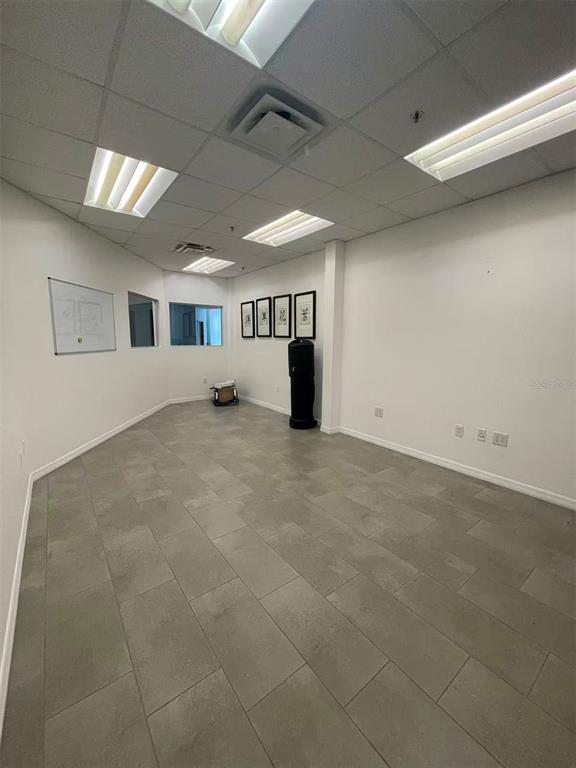 7075 Kingspointe Parkway, Unit 9 Orlando, FL 32819 - Photo 35 of 49 a view of a livingroom with a stove