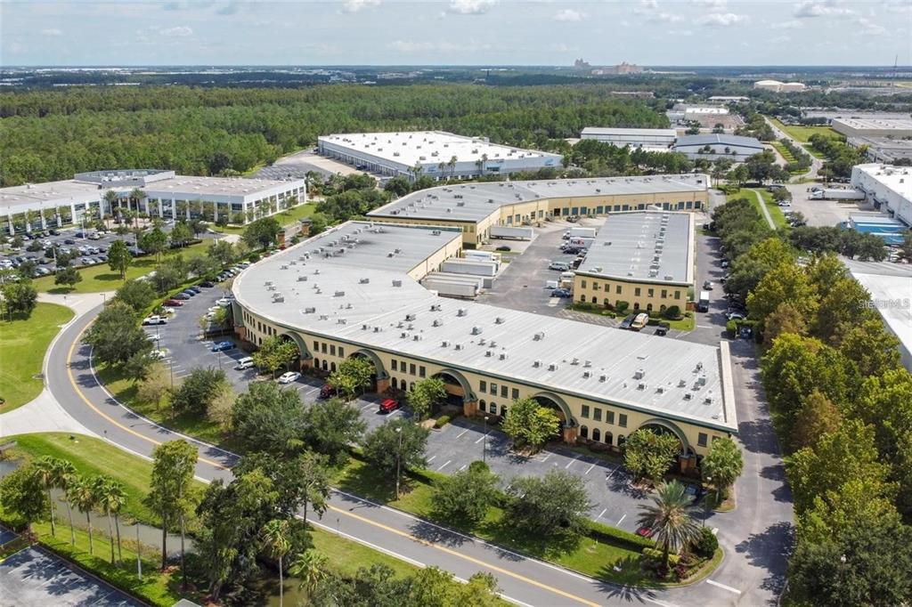 7075 Kingspointe Parkway, Unit 9 Orlando, FL 32819 - Photo 48 of 49 an aerial view of a city