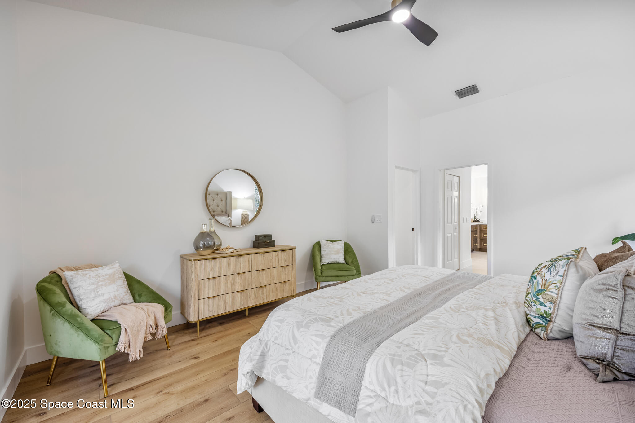 4737 Canard Road Melbourne, FL 32934 - Photo 21 of 35 a bedroom with bed and window