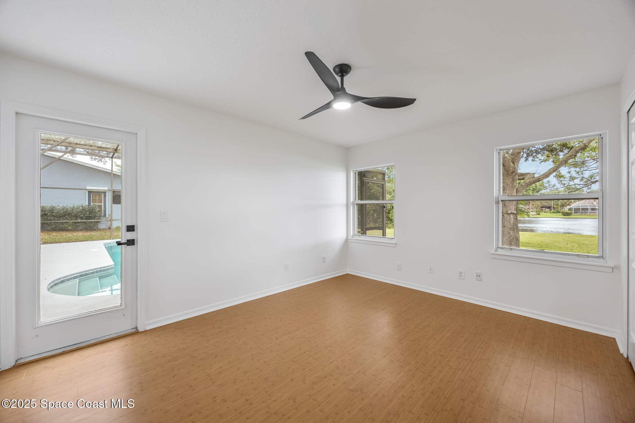 4737 Canard Road Melbourne, FL 32934 - Photo 26 of 35 a view of an empty room with a window