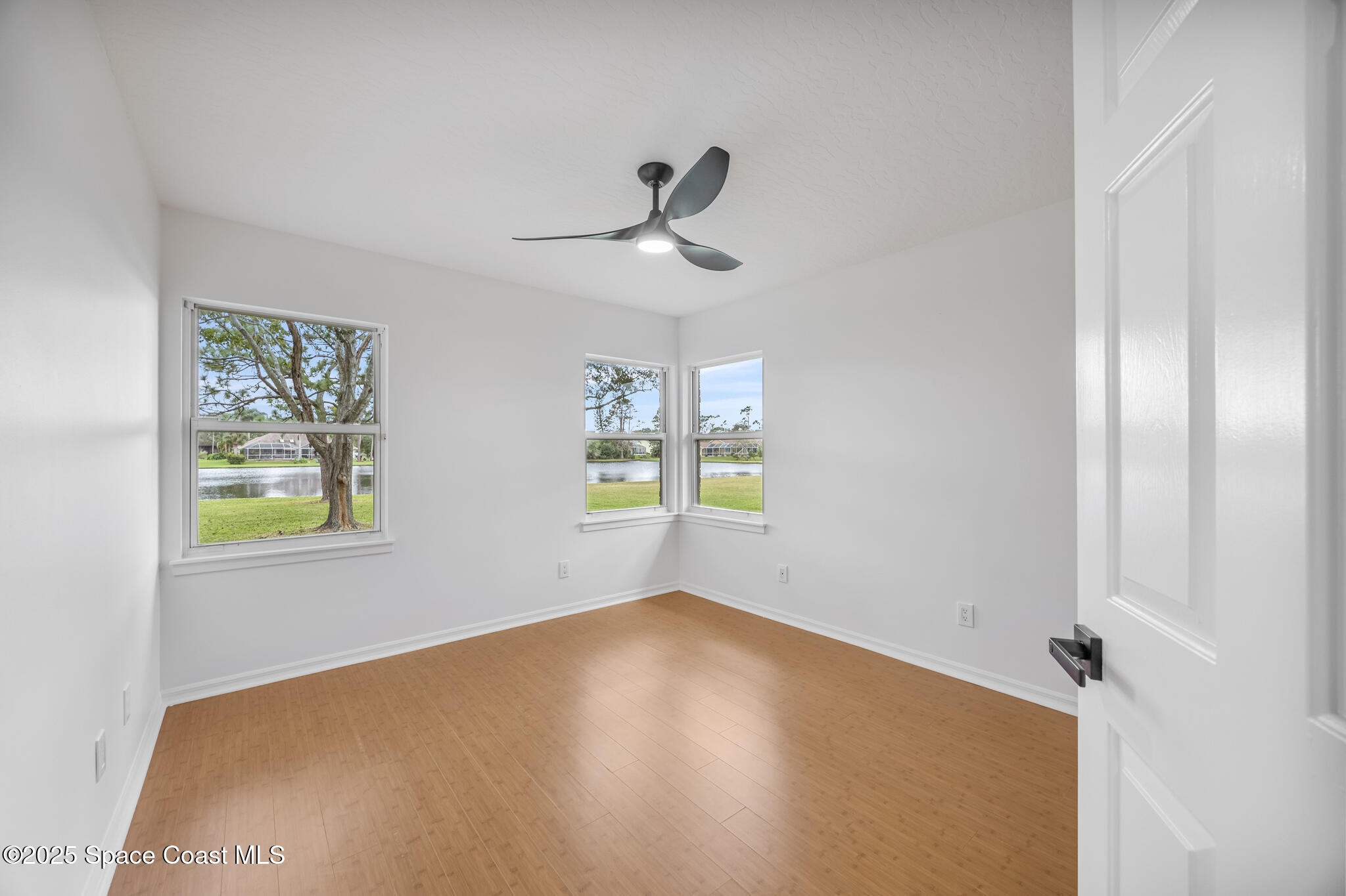 4737 Canard Road Melbourne, FL 32934 - Photo 27 of 35 a view of empty room with windows