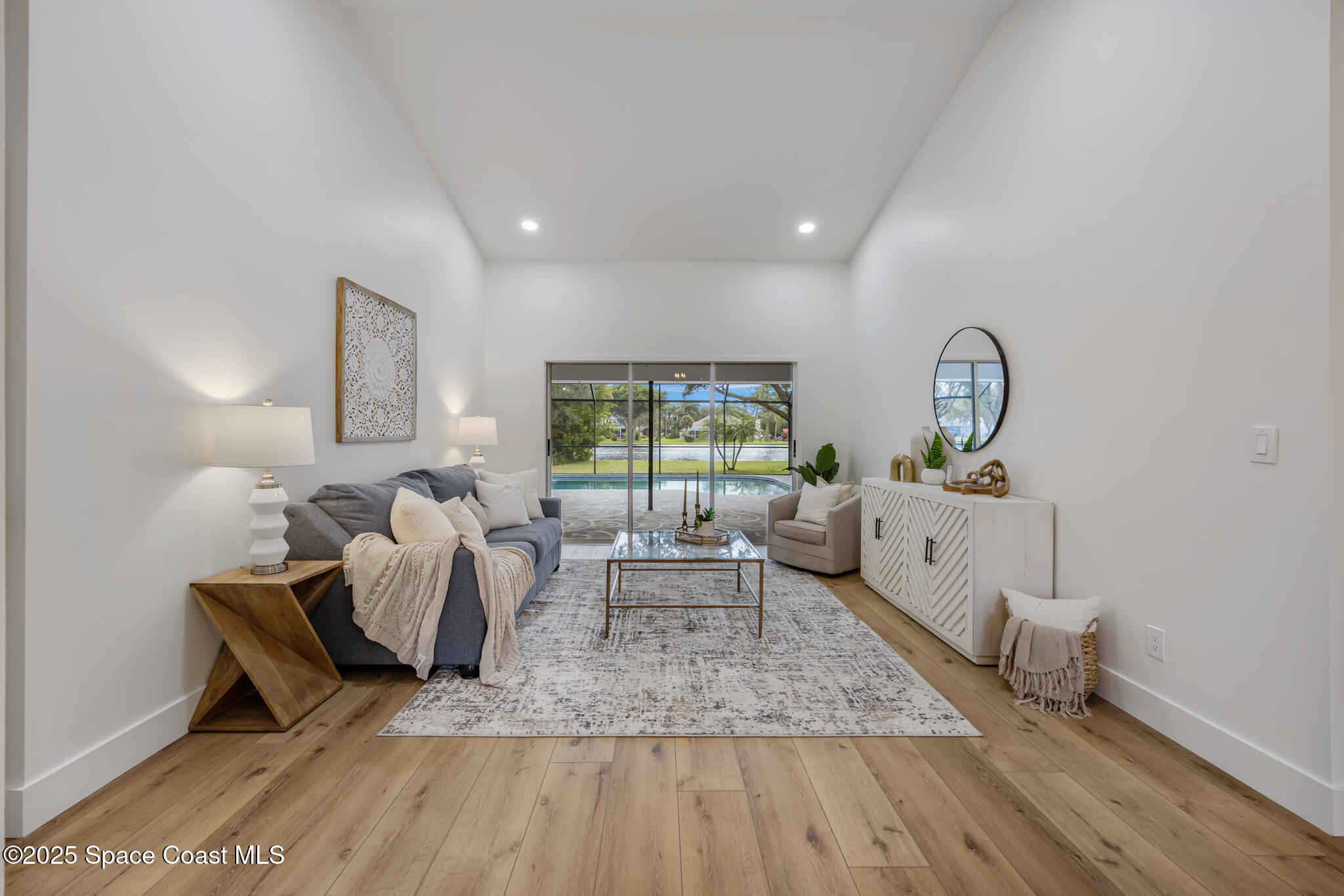 4737 Canard Road Melbourne, FL 32934 - Photo 4 of 35 a living room with furniture rug and window