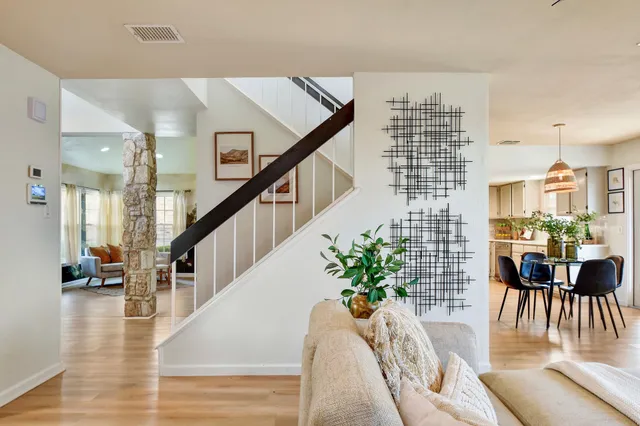 a view of a living room and dining room