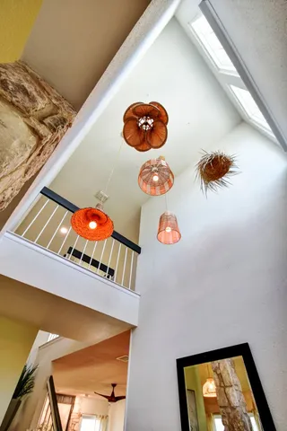 a view of entryway with a rug and a potted plant