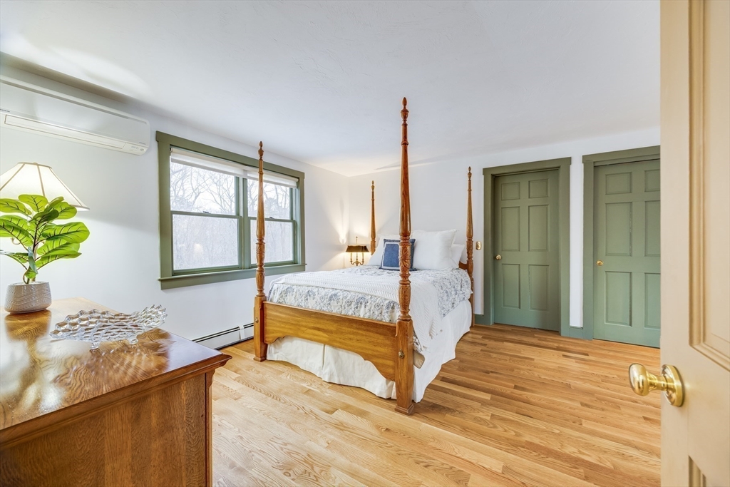 3 Popes Meadows Sandwich, MA 02563 - Photo 27 of 41 a bedroom with a bed window and table