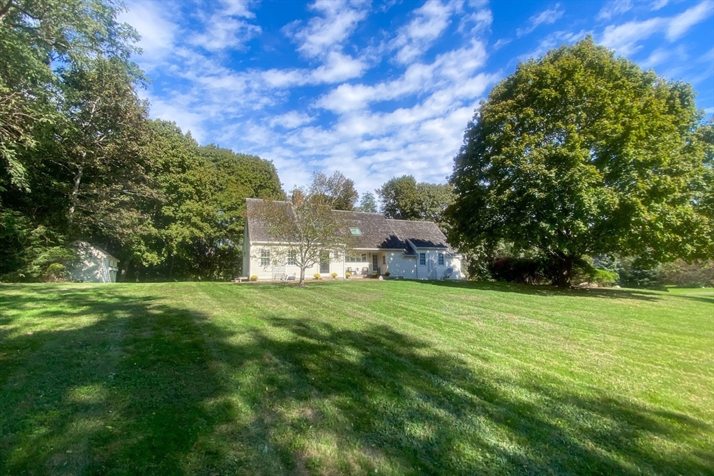 3 Popes Meadows Sandwich, MA 02563 - Photo 40 of 41 a view of a big yard with plants and large trees