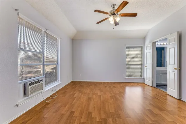 a bathroom with a bathtub and a sink