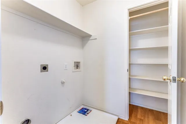 a view of backyard with wooden fence