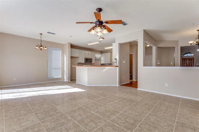 a kitchen with stainless steel appliances granite countertop a stove and a sink