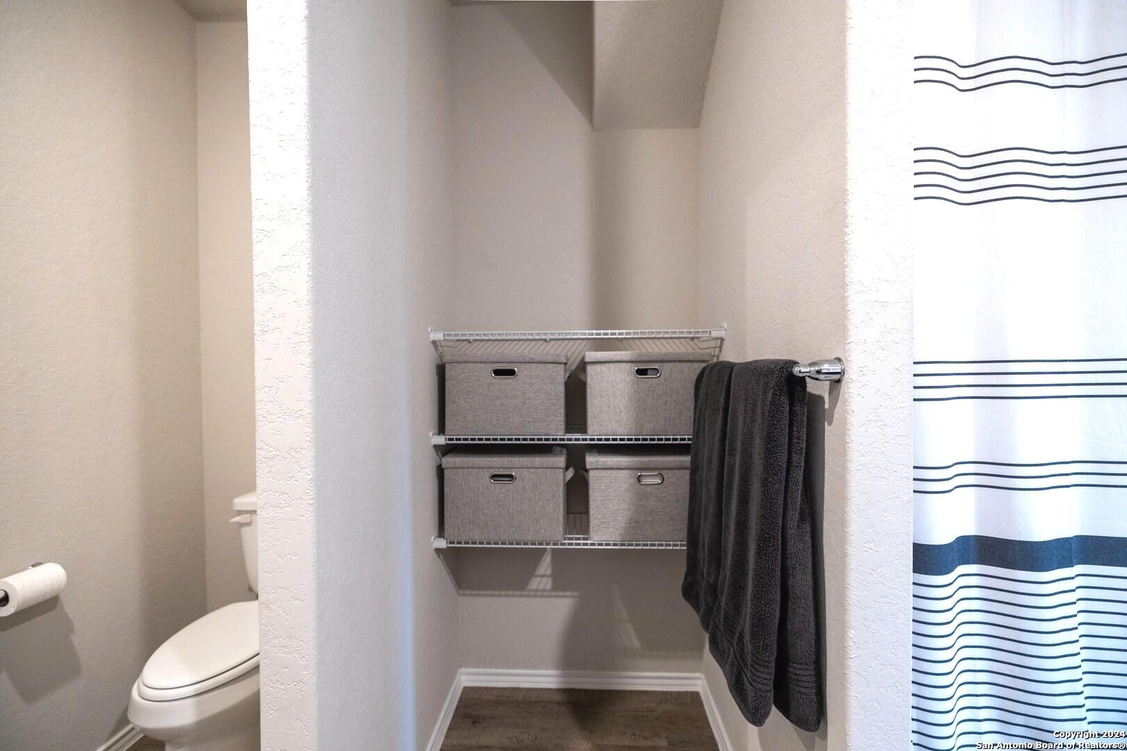 3431 Andromeda Way Converse, TX 78109 - Photo 15 of 24 a view of bathroom with a sink toilet and a window