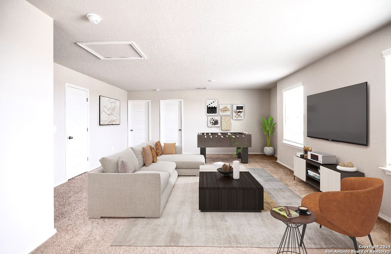 3431 Andromeda Way Converse, TX 78109 - Photo 16 of 24 a living room with furniture and a flat screen tv