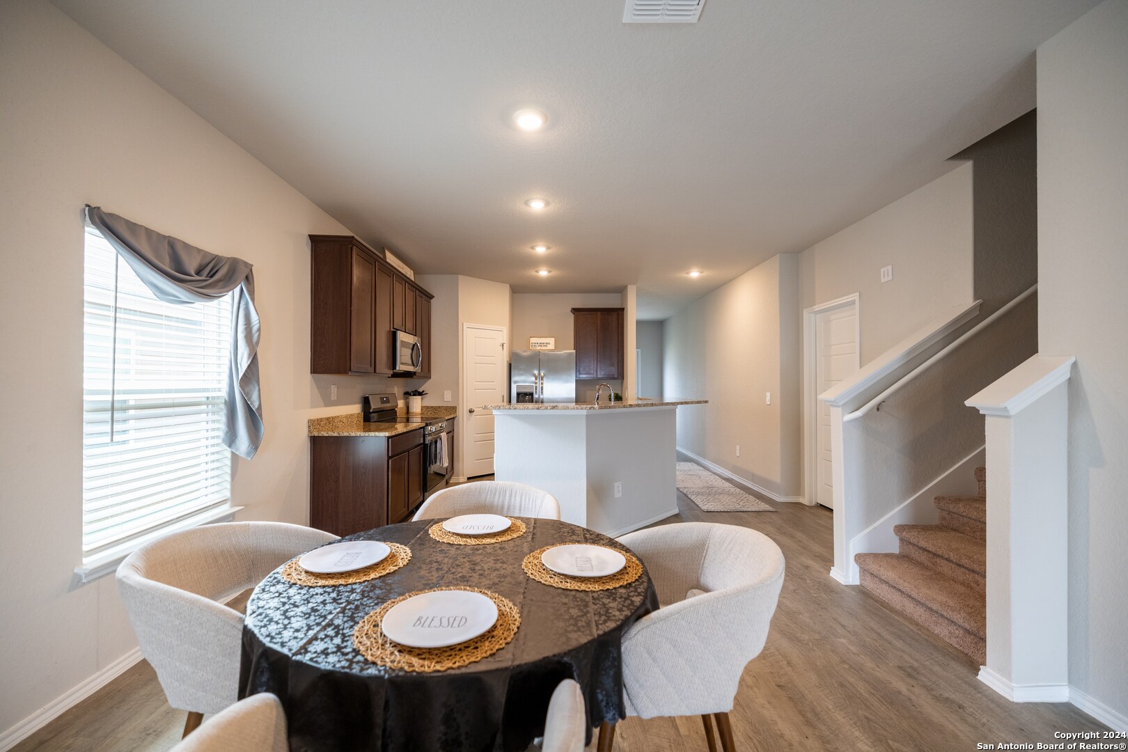 3431 Andromeda Way Converse, TX 78109 - Photo 3 of 24 a view of a dining room with furniture