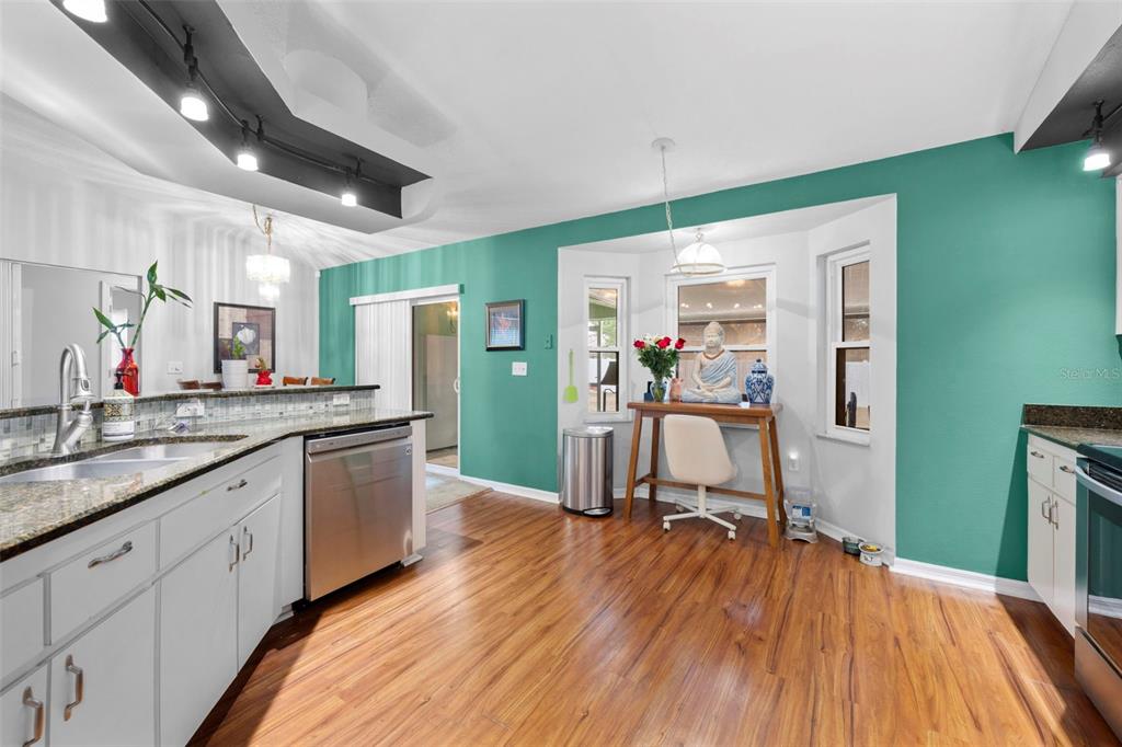 11244 Redgate Street Spring Hill, FL 34609 - Photo 11 of 50 a room with sink and mirror