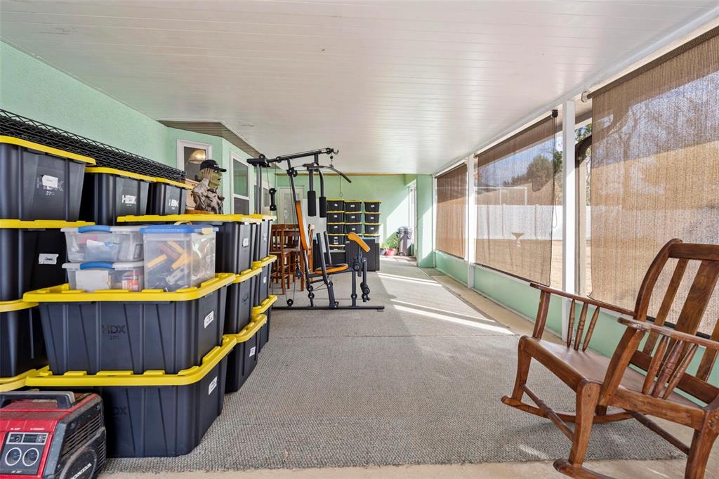 11244 Redgate Street Spring Hill, FL 34609 - Photo 24 of 50 a view of an outdoor space with seating area