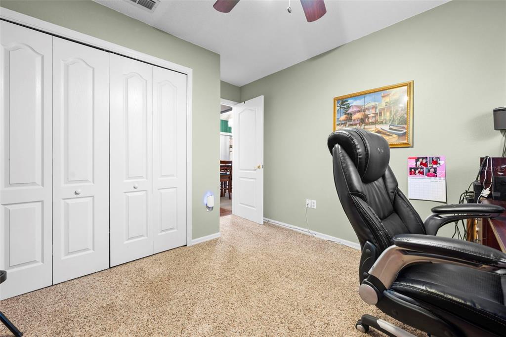 11244 Redgate Street Spring Hill, FL 34609 - Photo 35 of 50 a view of a workspace with furniture and entryway