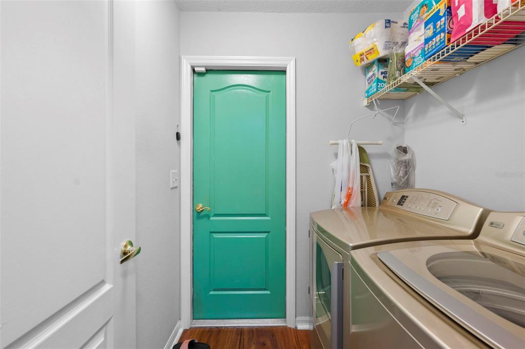11244 Redgate Street Spring Hill, FL 34609 - Photo 37 of 50 a bathroom with a sink a toilet and vanity
