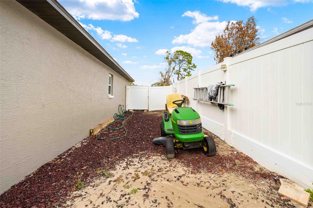 11244 Redgate Street Spring Hill, FL 34609 - Photo 44 of 50 a garden view