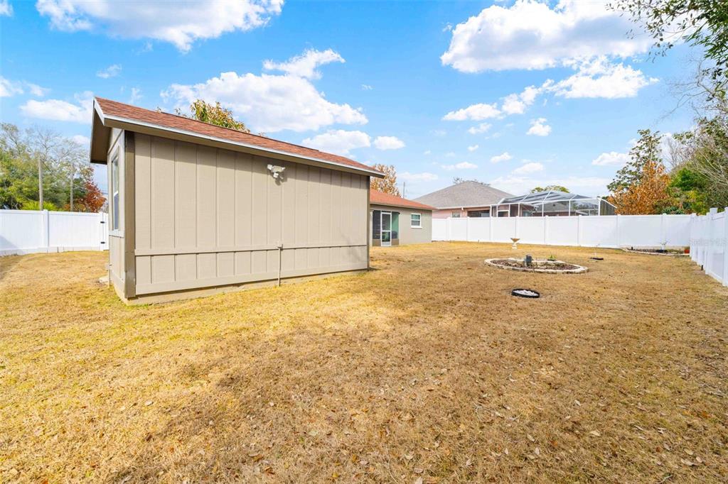 11244 Redgate Street Spring Hill, FL 34609 - Photo 48 of 50 a view of a outdoor space