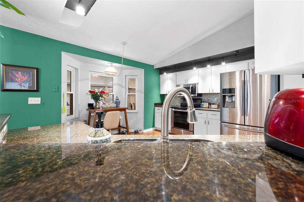 11244 Redgate Street Spring Hill, FL 34609 - Photo 10 of 50 a view of a room with gym equipment