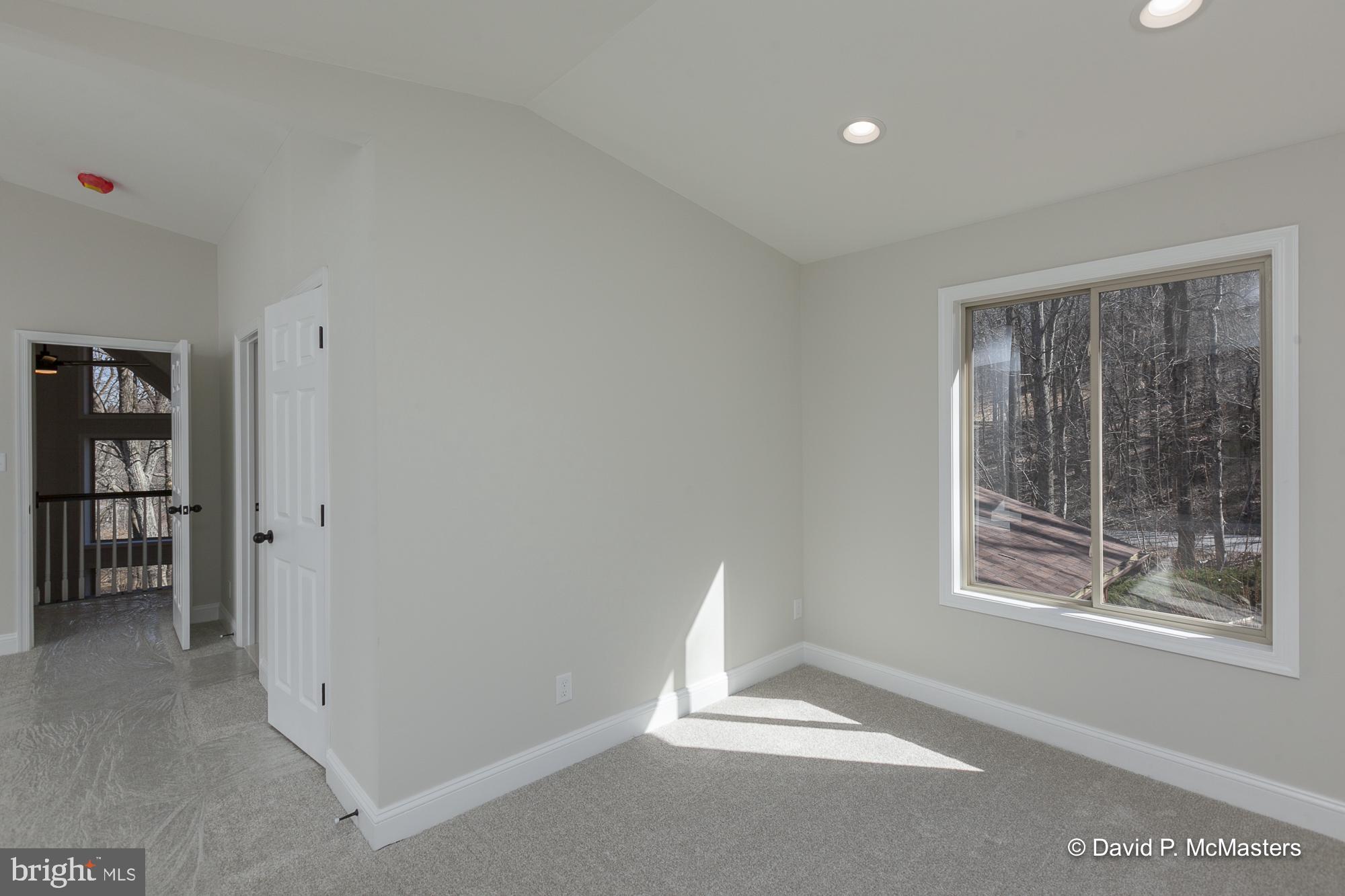 760 High Knob Road Front Royal, VA 22630 - Photo 36 of 63 a view of an empty room with a window
