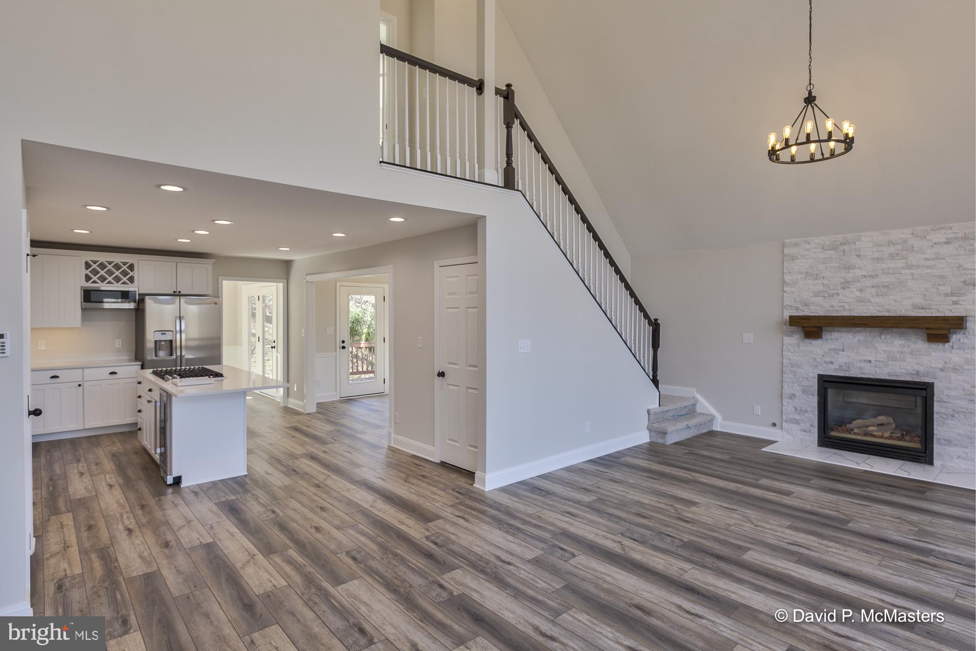 760 High Knob Road Front Royal, VA 22630 - Photo 5 of 63 a view of a living room and a livingroom with wooden floor