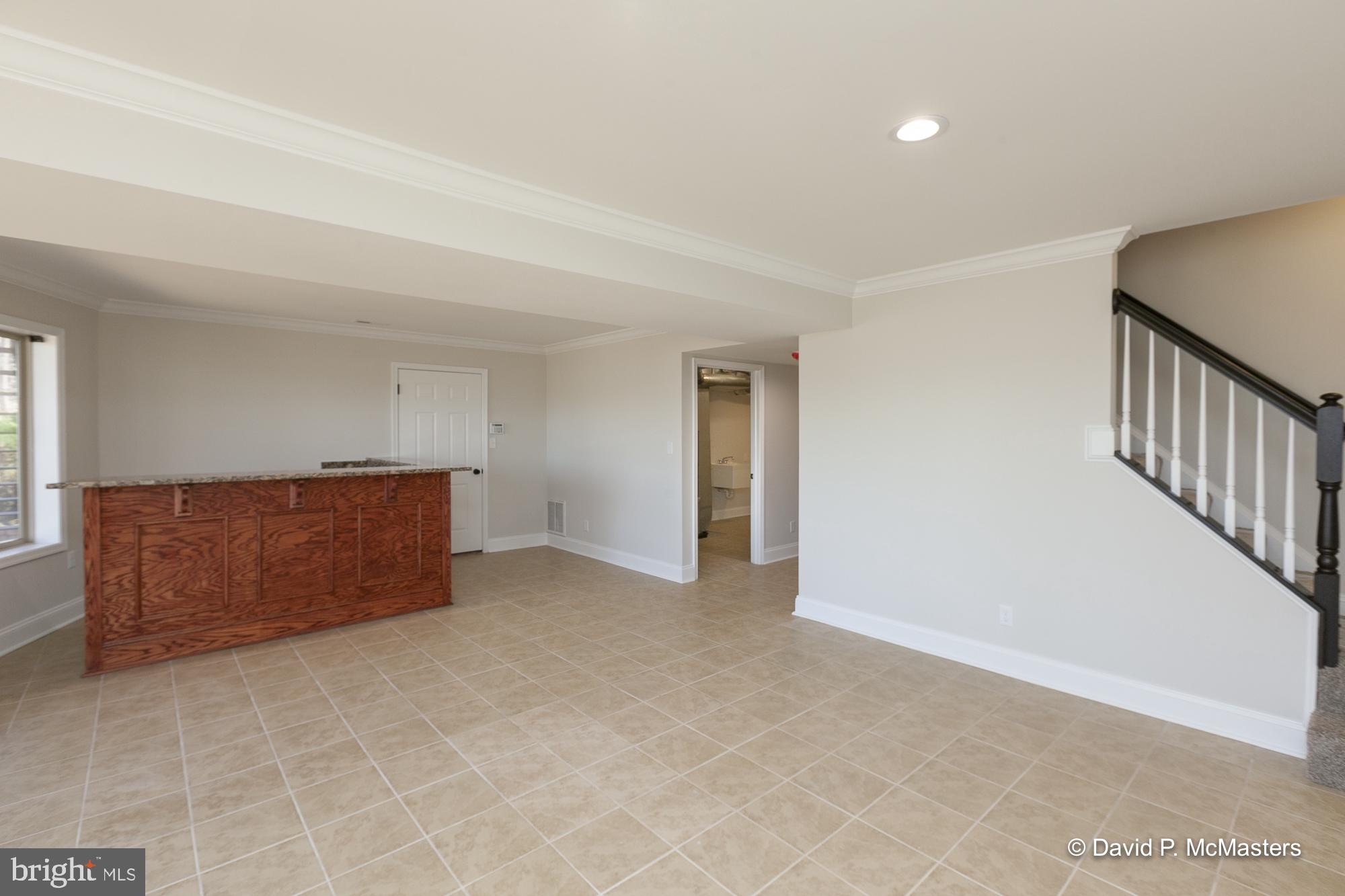 760 High Knob Road Front Royal, VA 22630 - Photo 50 of 63 a view of an empty room with wooden floor