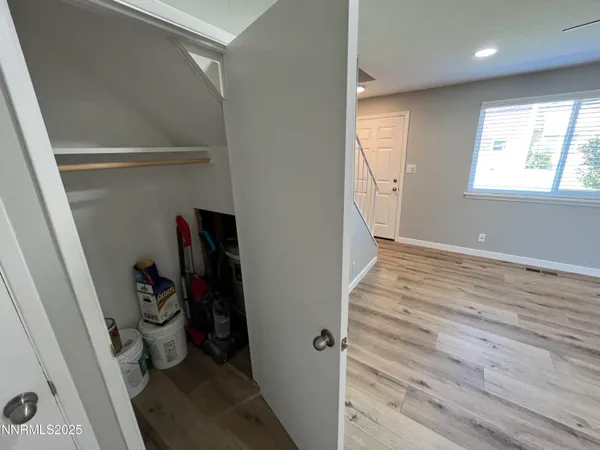 a view of a room with rack on the wall