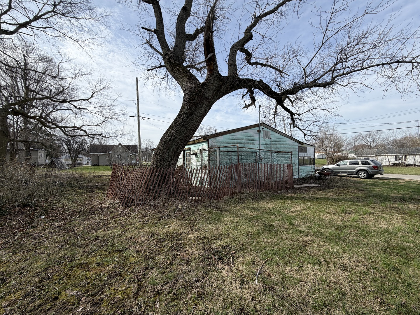 538 North Austin Street Paris, IL 61944 - Photo 11 of 12 a view of a house with a yard