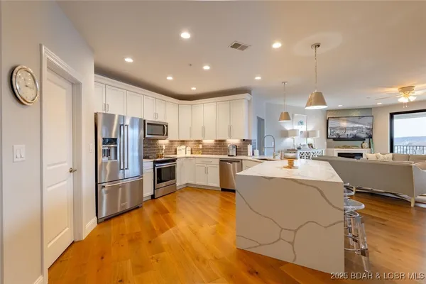 $1,550,000 | 166 Captiva Drive, Unit 3E, Sunrise Beach, MO 65079