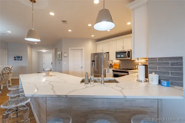 $1,550,000 | 166 Captiva Drive, Unit 3E, Sunrise Beach, MO 65079