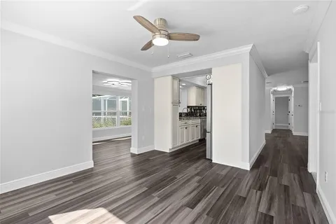a view of a livingroom with wooden floor