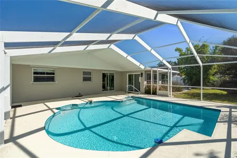 a view of a house with swimming pool