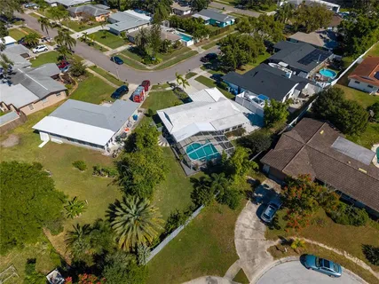 an aerial view of residential house with outdoor space