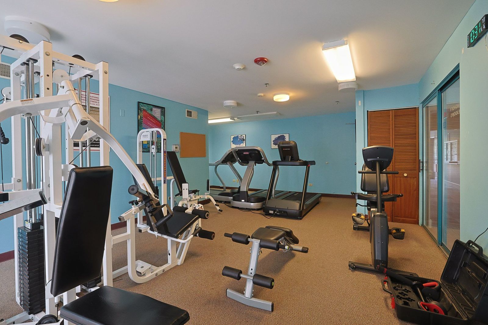 3265 Kirchoff Road, Unit 127 Rolling Meadows, IL 60008 - Photo 18 of 22 a view of a room with gym equipment