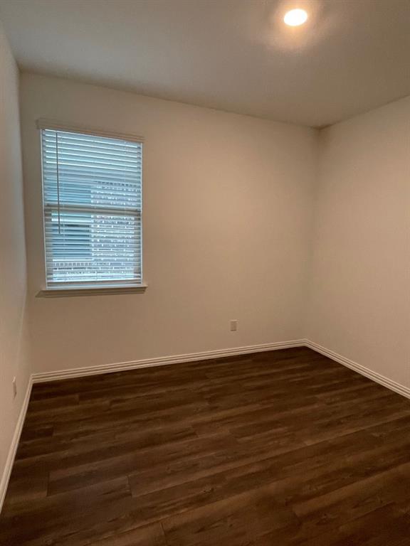 3700 Milkweed Road McKinney, TX 75071 - Photo 8 of 18 Crisp interior with wood-finish flooring and neutral wall tones